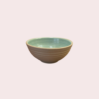 A large ceramic bowl with brown stoneware finish outside and green glaze inside. Buy kitchenware in Bangalore.