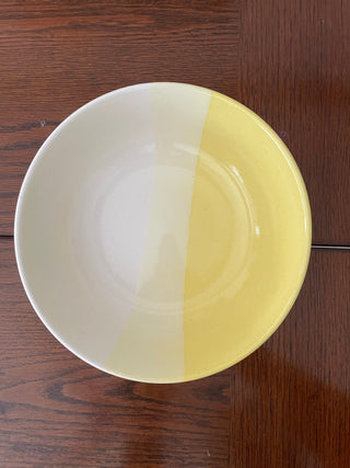 Medium ceramic bowl: white, yellow, light yellow glaze in 3 sections on wooden table. Shop unique gifting ideas in Bangalore.