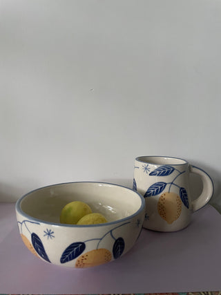 hand painted yellow lemons and blue leaf design on medium ceramic bowl and mug with handle, Shop artistic ceramics Bangalore